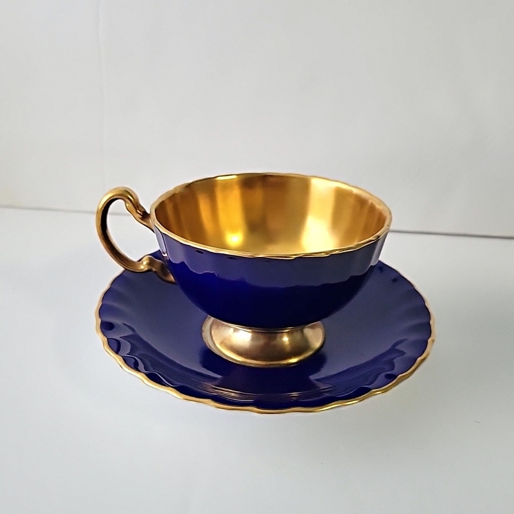 Rare Aynsley Blue and All Gold Tea Cup and Saucer 